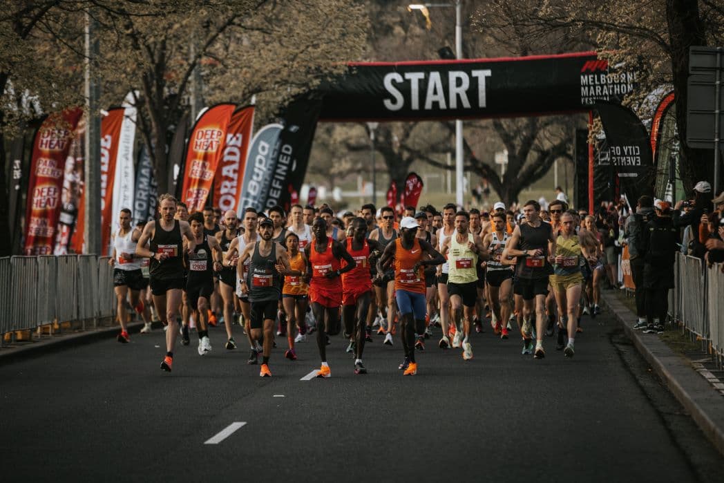 Runners setting off from the Melbourne Marathon start line.